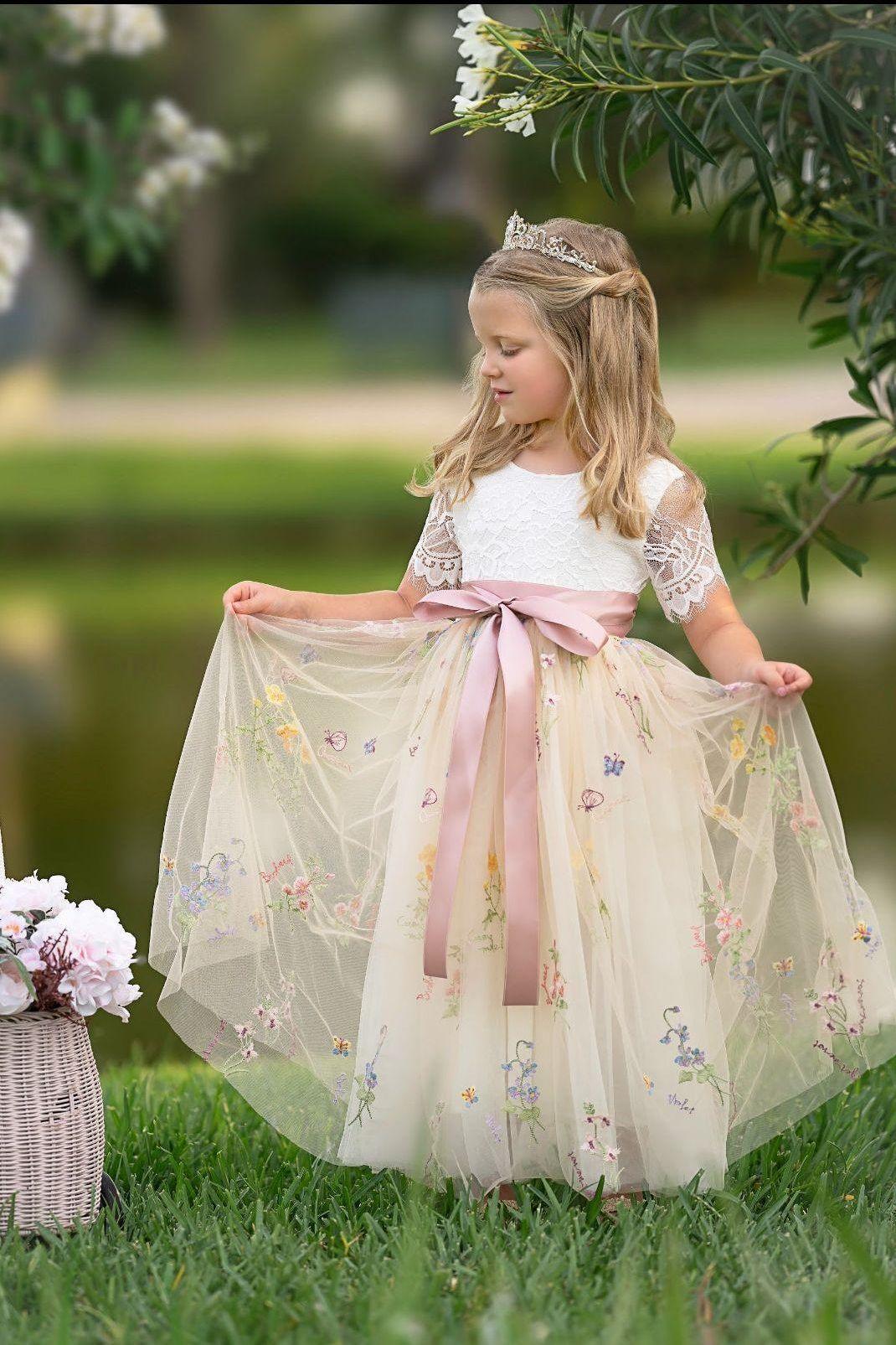 Toddler and junior bridesmaids dress with wildflower floral embroidered tulle skirting. The Best Flower Girl Dress this season.