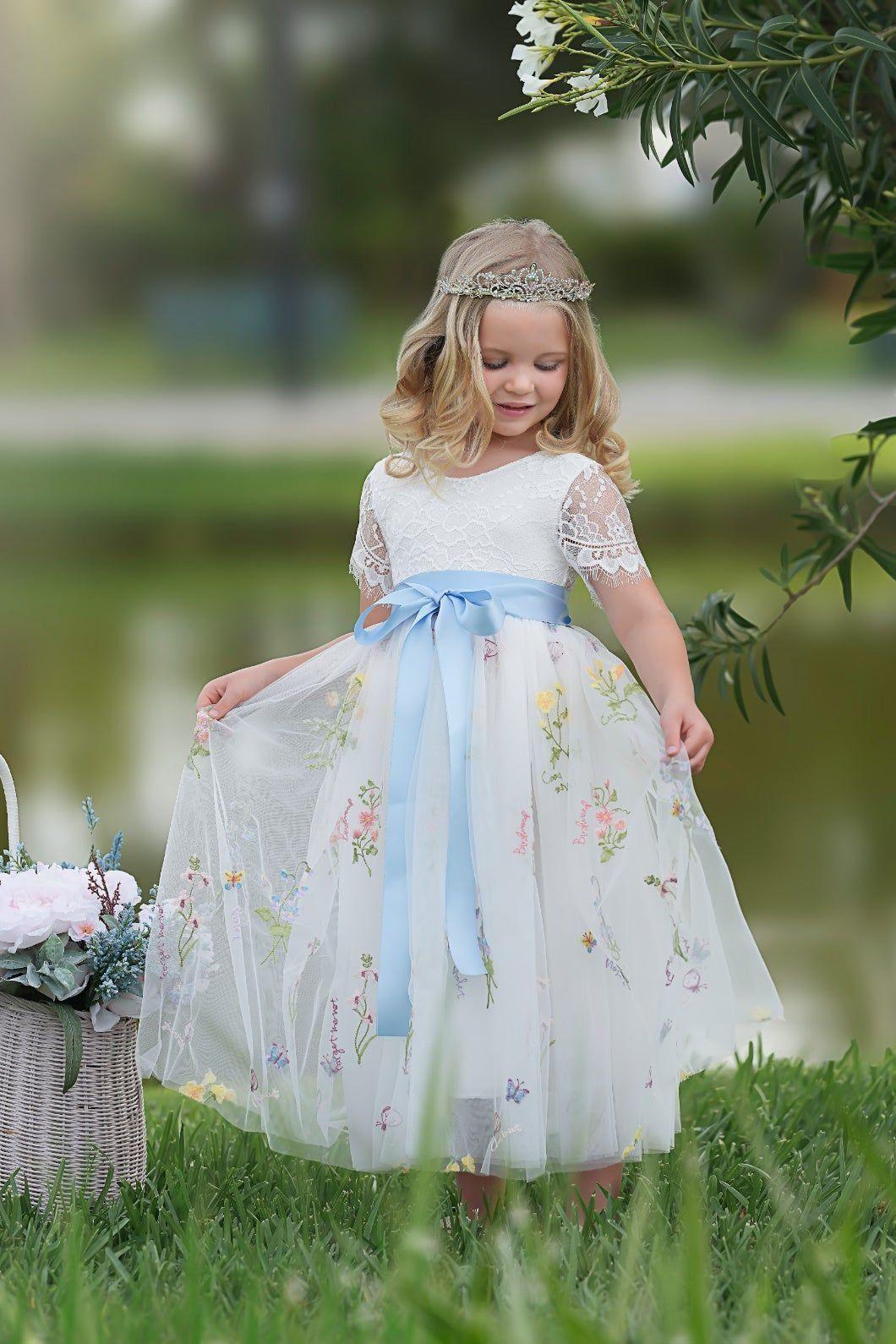 Short Sleeve floral embroidered wildflower white tulle flower girl dress. Makes the perfect toddler flower girl dress and junior bridesmaids dress 