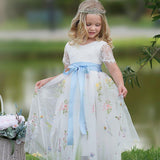 Short Sleeve floral embroidered wildflower white tulle flower girl dress. Makes the perfect toddler flower girl dress and junior bridesmaids dress 