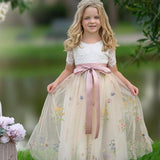 Short sleeve floral embroidered flower girl dresses with champagne tulle. 