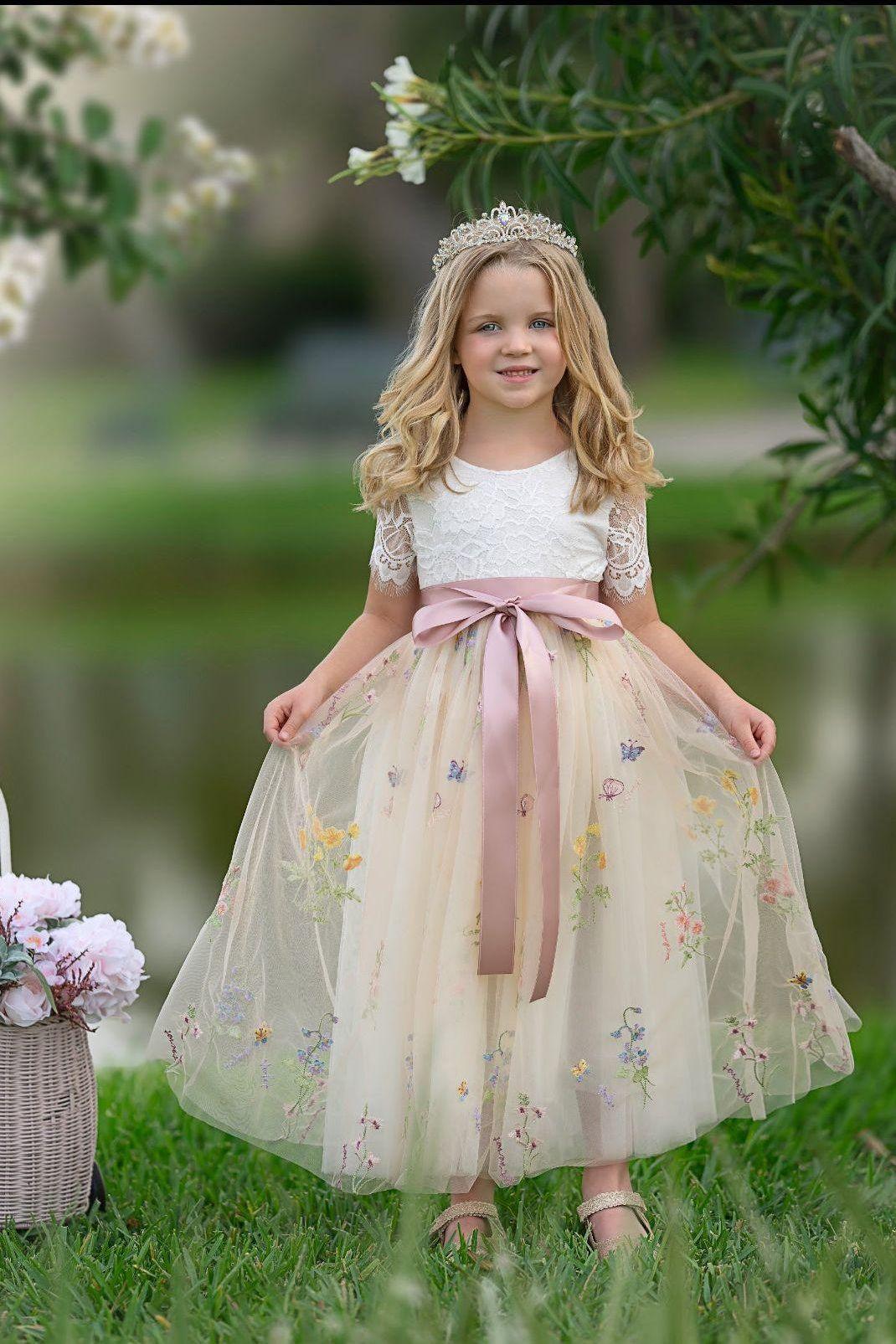 Short sleeve floral embroidered flower girl dresses with champagne tulle. 