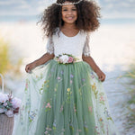 Floral embroidered toddler flower girl dress with wildflower embroidered flowers on the sage green tulle skirting. 