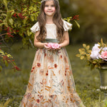 Champagne velvet flower girl dress with floral embroidered tulle skirting for weddings and special events. 