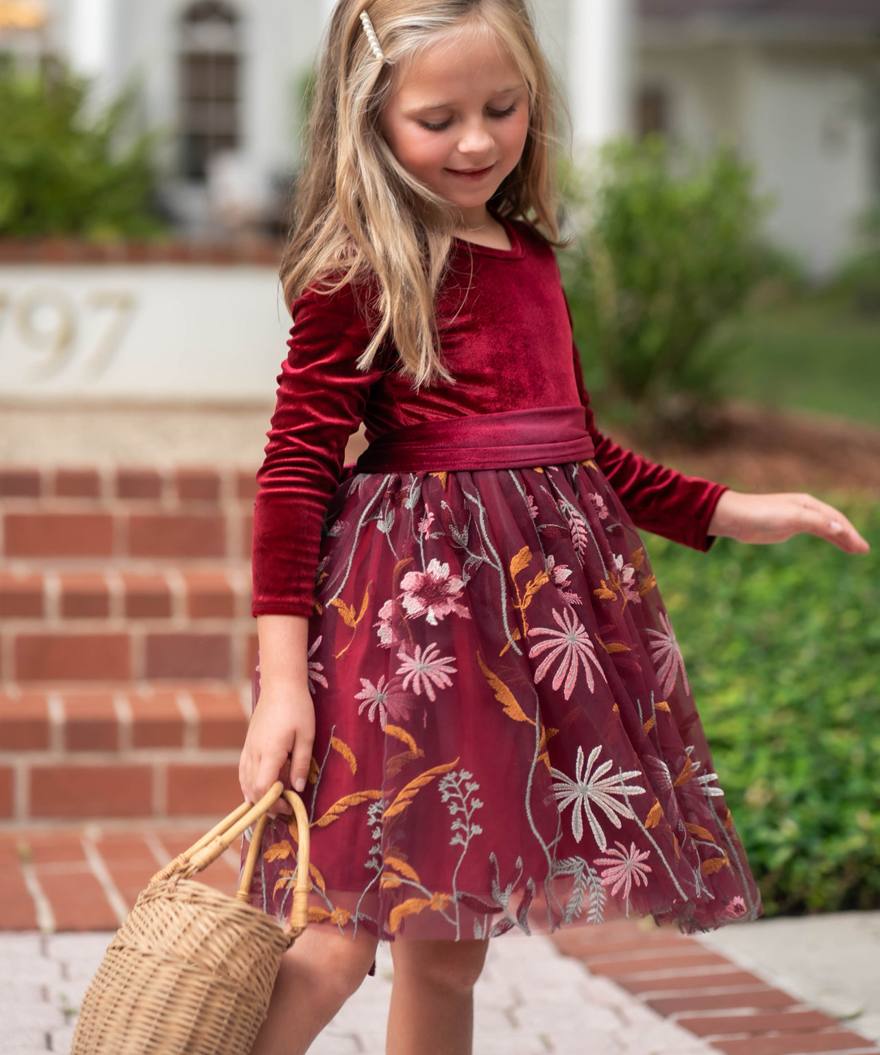 Burgundy velvet flower girl dress front view with floral embroidered tulle skirt