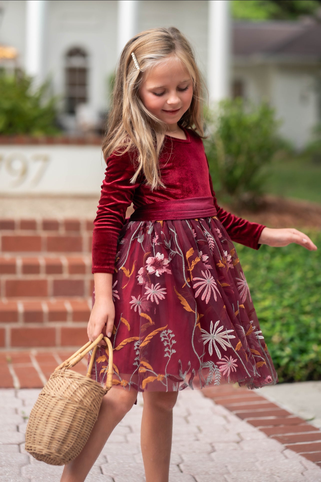 Burgundy velvet flower girl dress front view with floral embroidered tulle skirt